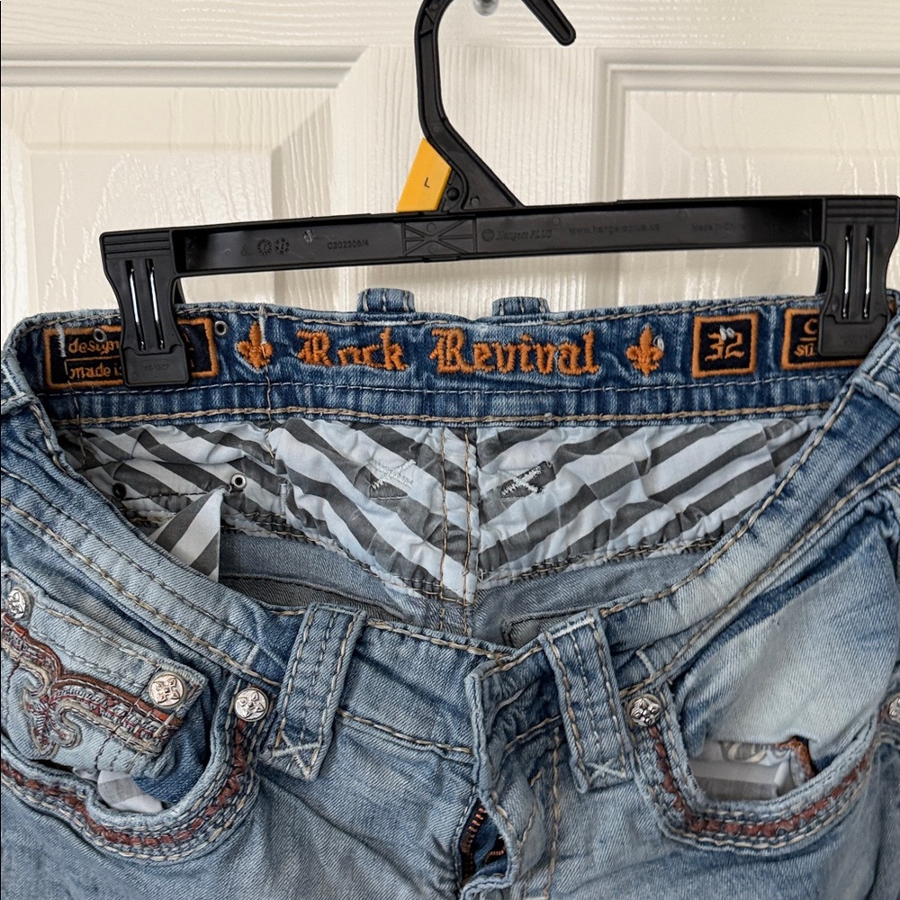 Rock Revival Light Blue Denim Jeans with Orange Logo Trim